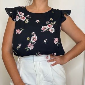 Beautiful black with colorful flowers blouse.